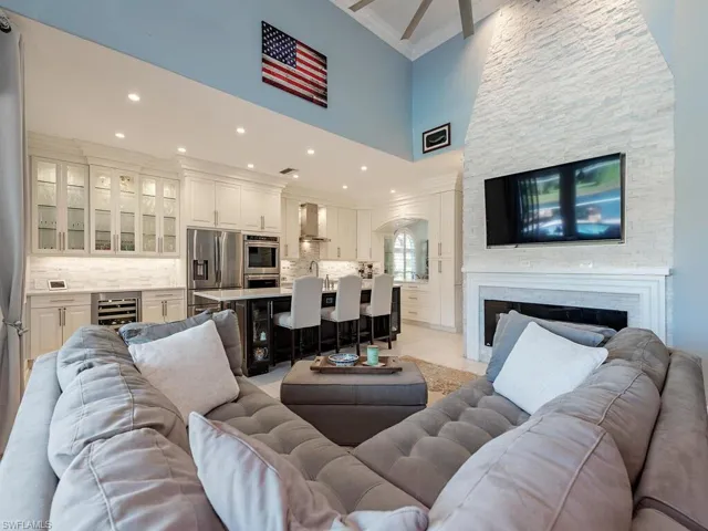 3760 Baldwin Ln, Naples FL 34116 - Beautiful white stacked stone accent above fireplace
