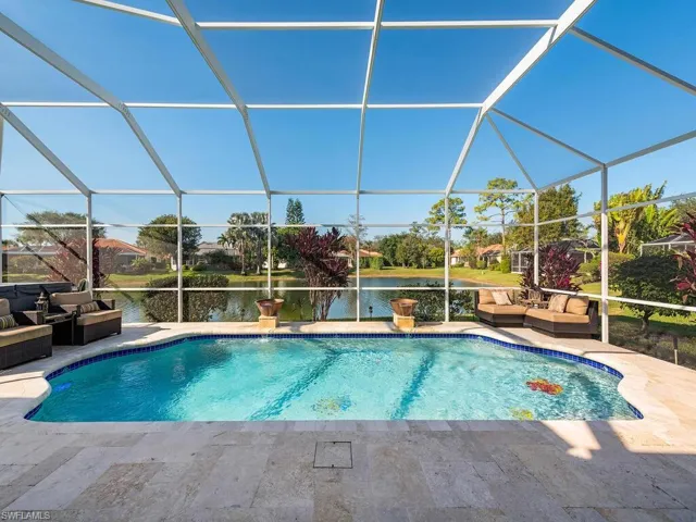 3760 Baldwin Ln, Naples FL 34116 - Long lake view from lanai