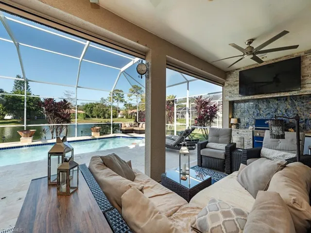 3760 Baldwin Ln, Naples FL 34116 - Storm protected lanai with outdoor kitchen