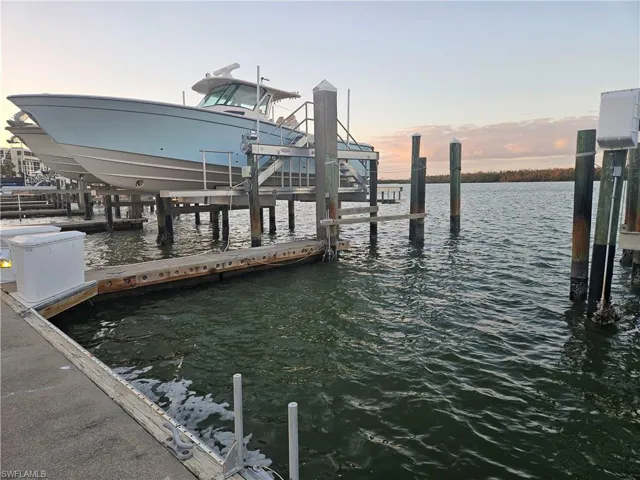 View of dock with a water view