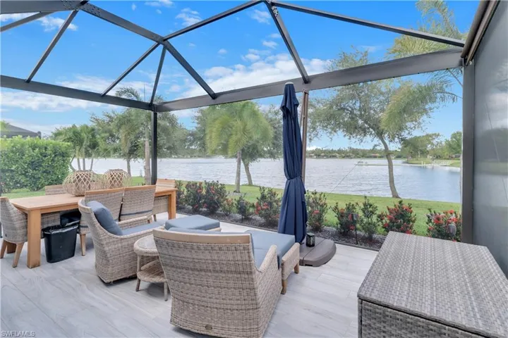Sunroom with a water view