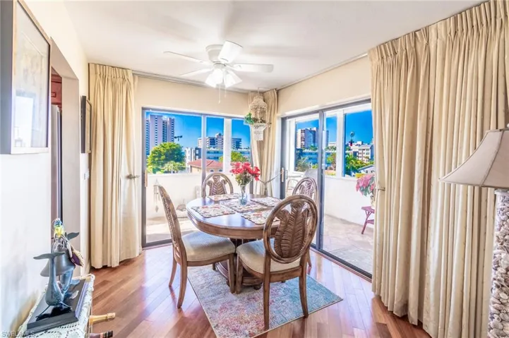 Dining room featuring hardwood / wood-style floors and ceiling fan