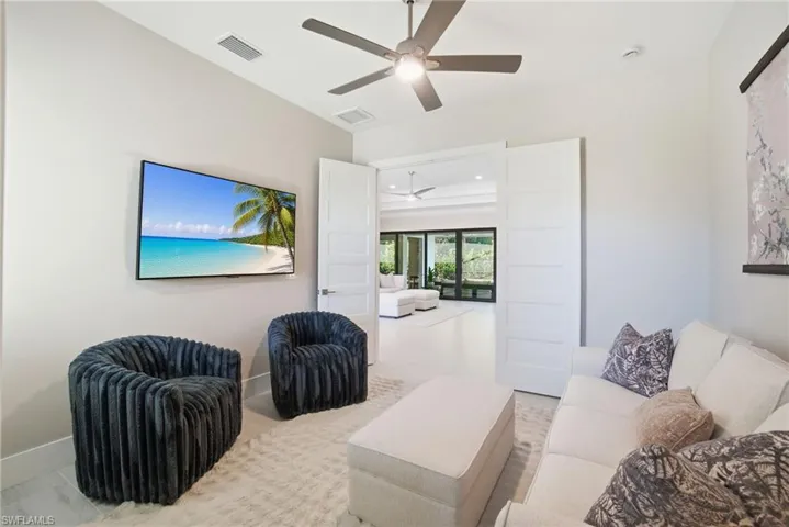 Den/Bedroom with ceiling fan