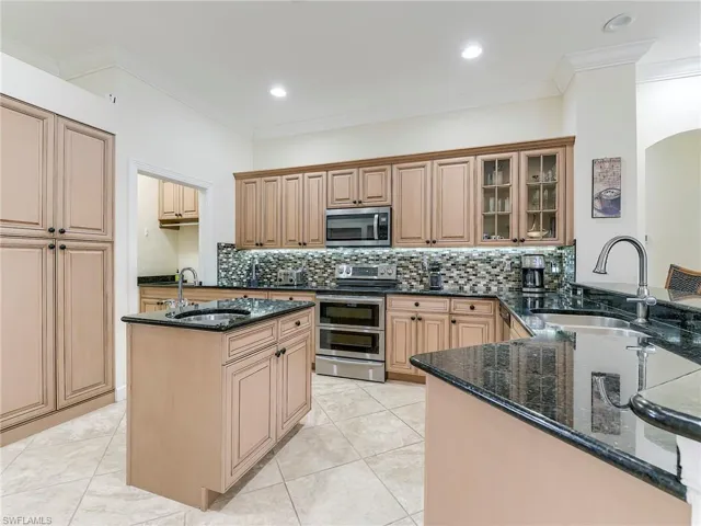 Kitchen has a wet island