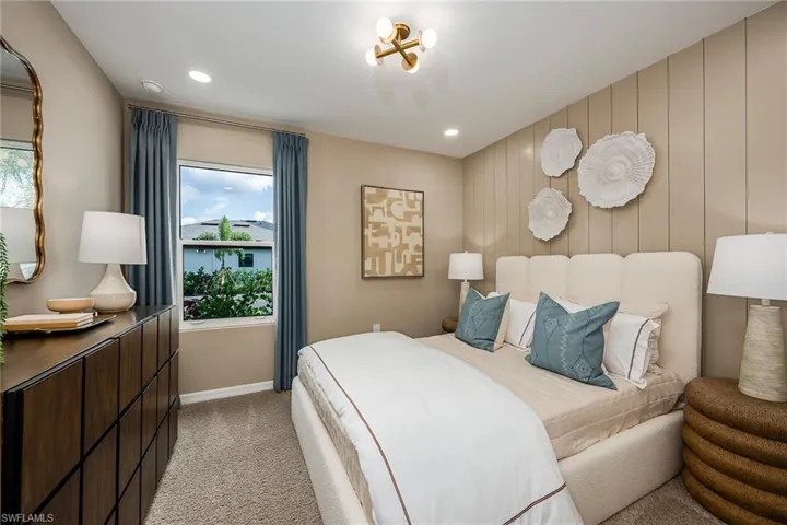 Bedroom featuring light colored carpet and recessed lighting