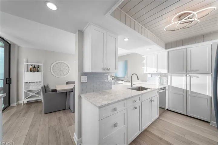 Updated Kitchen, Wood Cabinets, Built in Pantry, Quartz Countertops