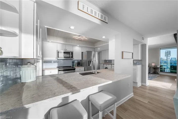 Stainless Steel Appliances & Breakfast Bar