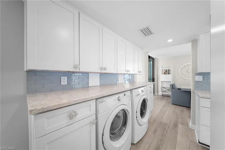 Additional Kitchen Cabinets, Quartz Counter & In Unit Washer & Dryer