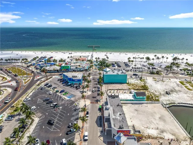 Bird's eye view of waterfront with a beach