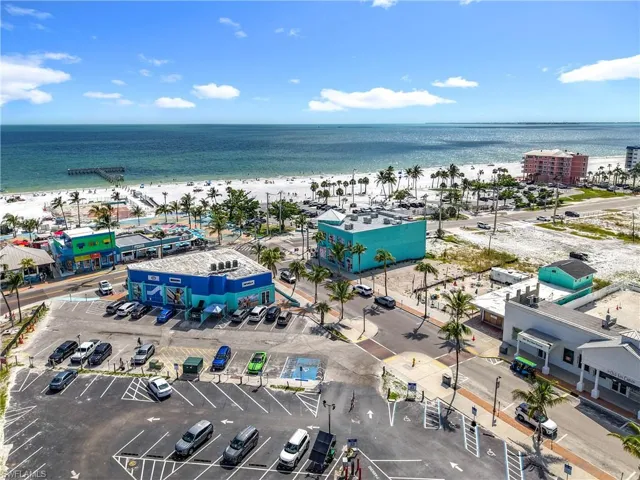 Bird's eye view of waterfront with a beach