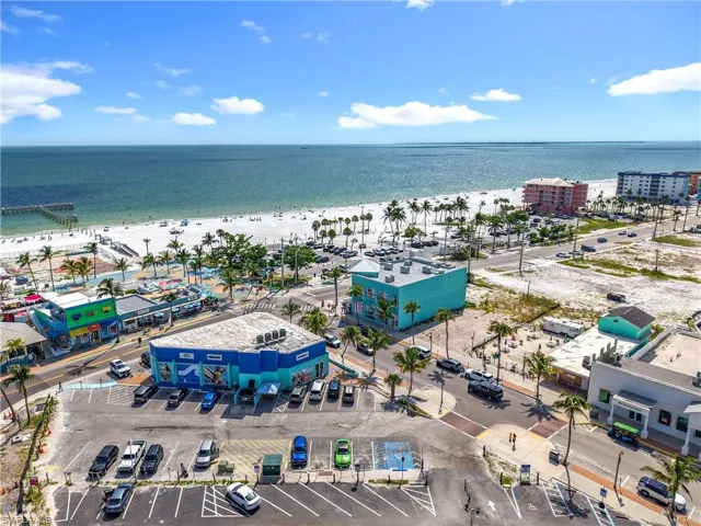 Bird's eye view of waterfront with a beach