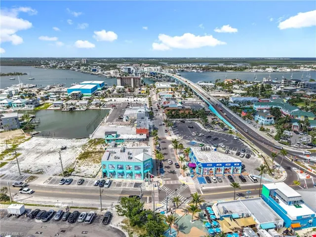View of urban area featuring a notable bridge and a large body of water