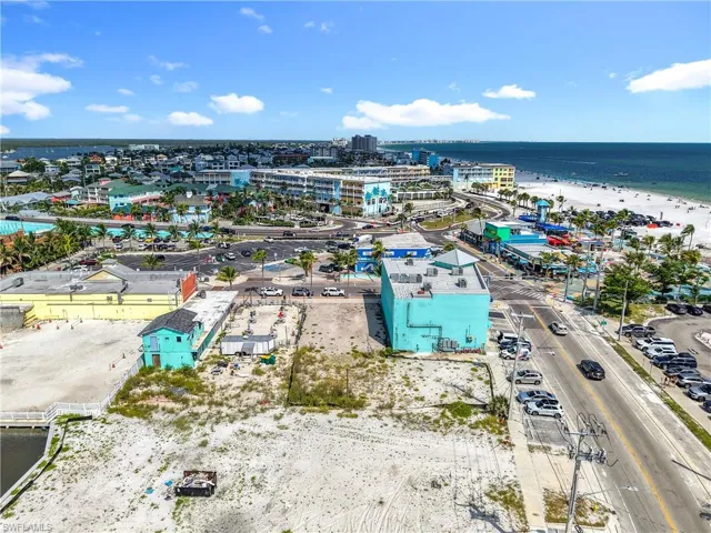 Bird's eye view of waterfront with a beach