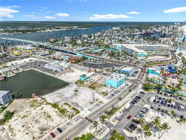 Aerial view of property's location with a notable bridge and a nearby body of water