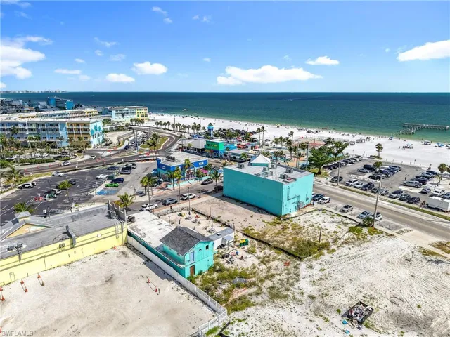 Bird's eye view of waterfront with a beach