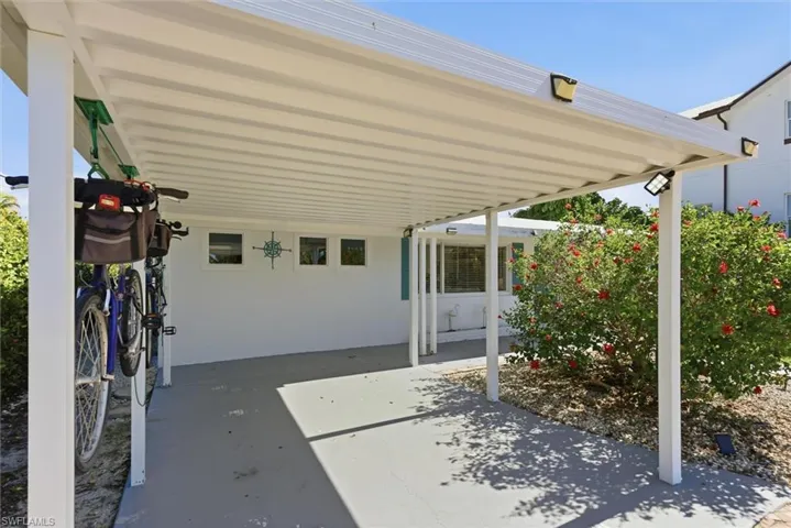 View of patio / terrace with an attached carport