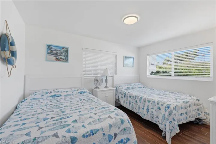 Bedroom featuring dark wood finished floors