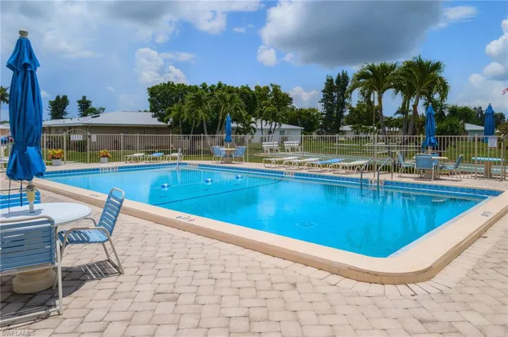Community pool featuring a patio area