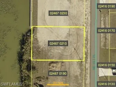 Aerial map of property and surrounding area with property parcel outlined