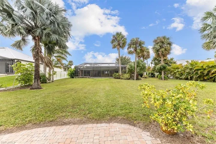 View of yard featuring a lanai