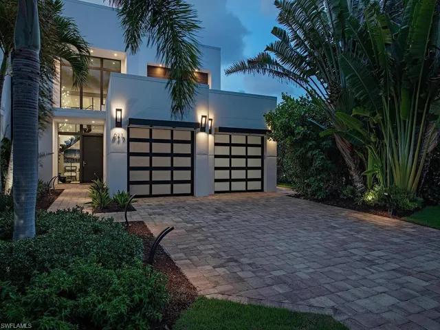 View of front of property with a garage
