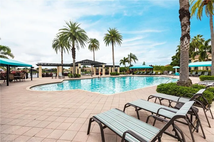 Community pool featuring a gazebo and a patio area