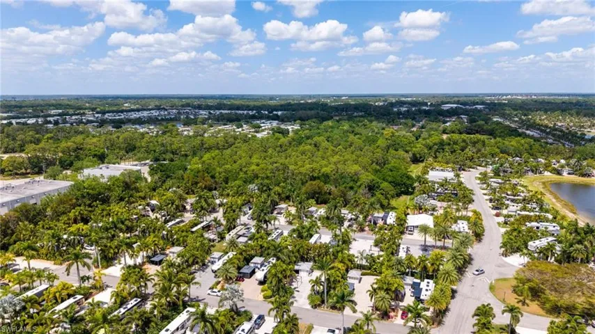 Bird's eye view with a residential view and a water view