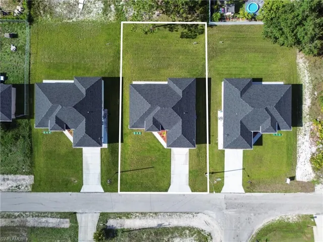 Aerial view of property's location featuring property parcel outlined
