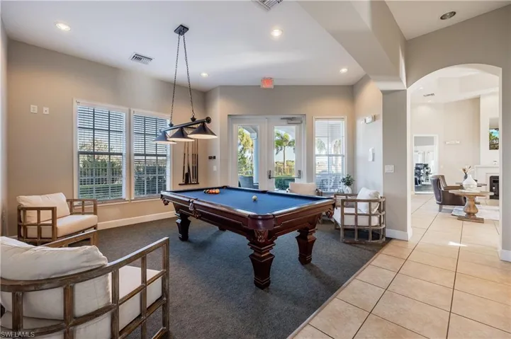 Game room with billiards, recessed lighting, and arched walkways