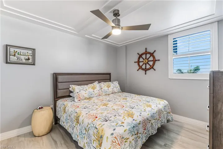 Bedroom featuring baseboards and a ceiling fan