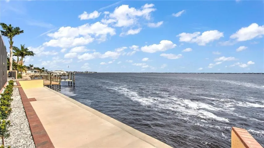 Captains Walk featuring a water view