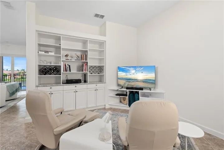 View of tiled living room