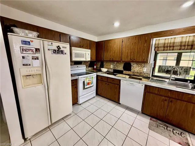 2400 E 3rd  ST, Lehigh Acres, FL 33936