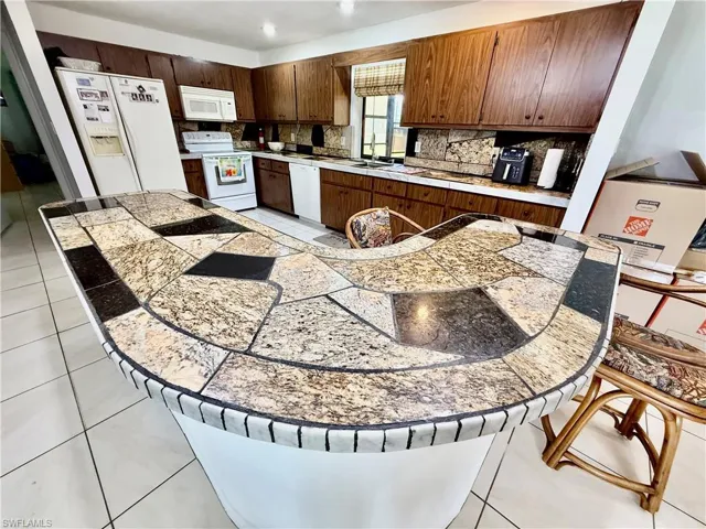 2400 E 3rd  ST, Lehigh Acres, FL 33936