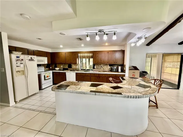 2400 E 3rd  ST, Lehigh Acres, FL 33936