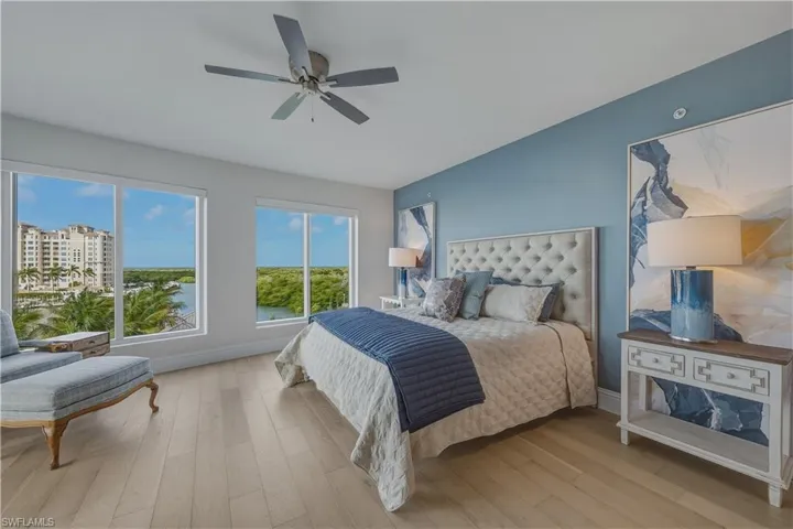Bedroom featuring light wood-style flooring and ceiling fan