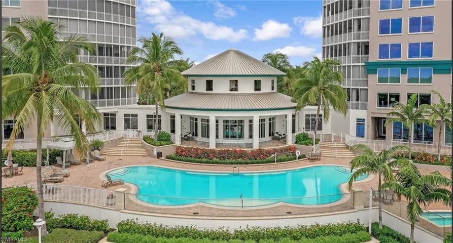 Community pool featuring a patio area