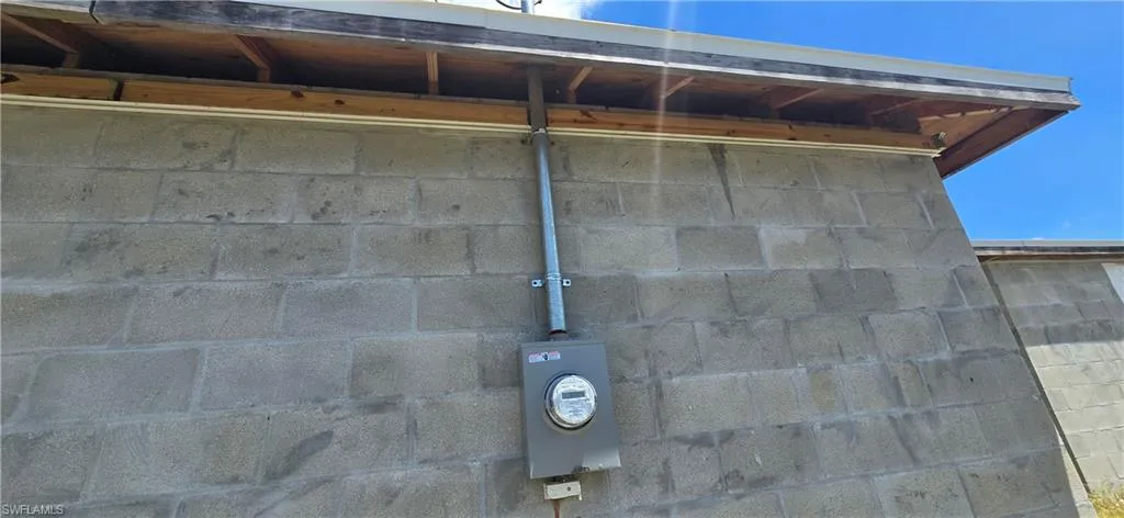 Exterior details featuring electric meter