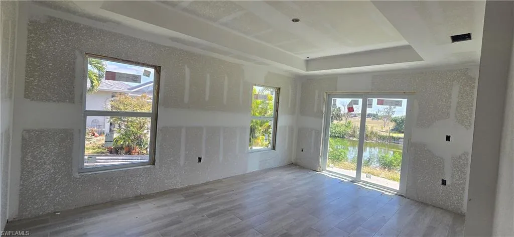 Unfurnished room featuring wood finished floors