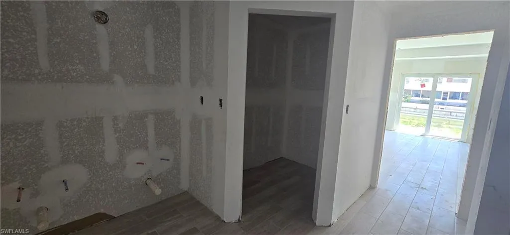 Bathroom featuring wood finish floors