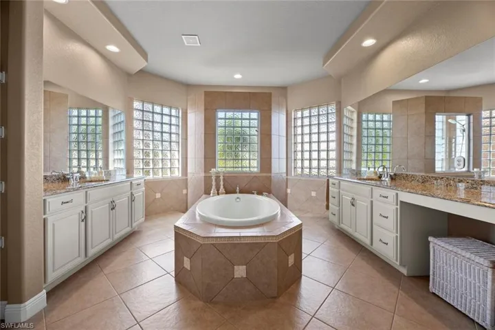 Master bath w/large tub, walk-in shower behind tub