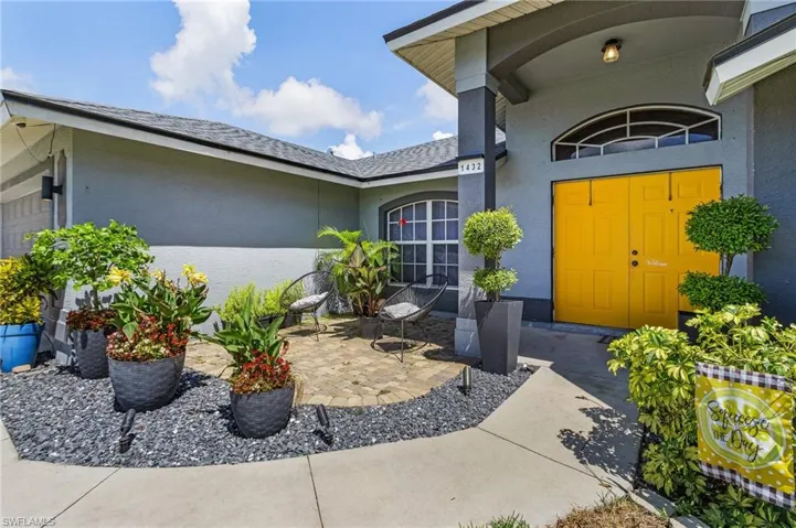Entrance to property with a patio