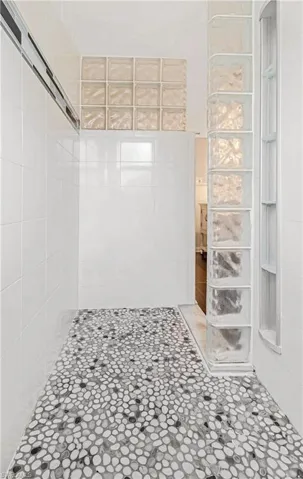 Bathroom with tiled shower