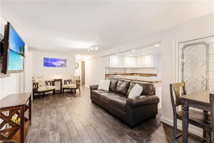 Living room featuring dark hardwood / wood-style floors
