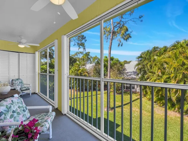 Sunroom / solarium with carpet flooring