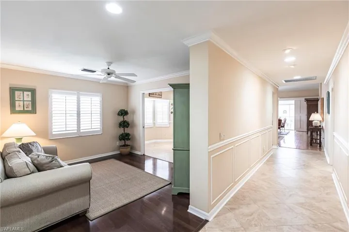 Flex space for den, office, family room. Pocket doors to close off kitchen.