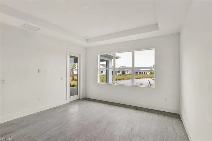 Primary bedroom suite with tray ceiling