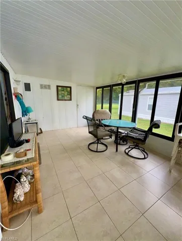 Florida Room with tile floors, heating and cooling, updated windows.