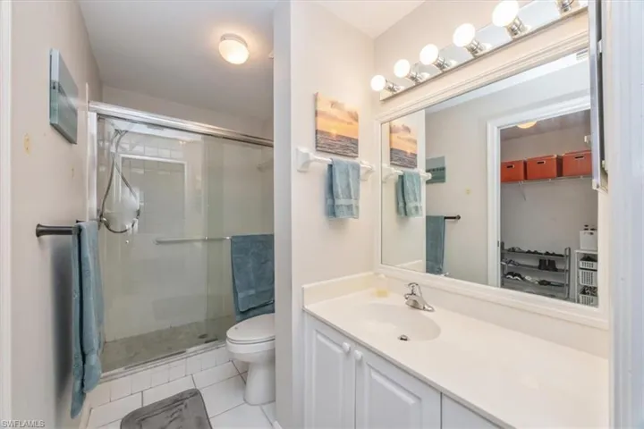 Primary bathroom, with adjacent walk-in closet