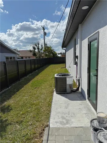 View of fenced backyard